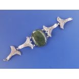 A modern silver cuttlefish shell bracelet set with green cabochon stone - 'GHC, HMN', Birmingham.