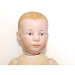 A German bisque head boy doll with blue painted eyes, painted hair - '6894, 16', 12".