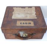 An Edwardian fitted leather travelling case, labelled for 'J.S. Vaughan, 1st Battalion, including
