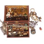 A brown jewellery box containing a micromosaic lidded box & brooch and other costume jewellery.
