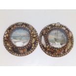 A small pair of shell-decorated circular frames having printed maritime scenes to the glazed