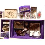 A white jewellery box, imitation diamond costume jewellery and other items.