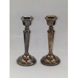 A small pair of plain modern silver candlesticks - ATC, Birmingham, 6.25" high. (2)