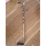 A silver mounted riding crop, 31" high.