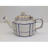 A 19thC Castleford teapot in white with blue lined borders, 10" across handle - a/f.