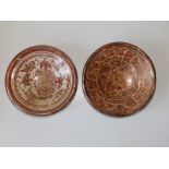 Two small 17thC Hispano-Moresque pink lustre dishes, bearing old BADA labels to centres, 8" diameter