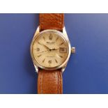 A gent's gold plated mid-size Rolex Oysterdate Precision with gold hands, centre seconds on brown