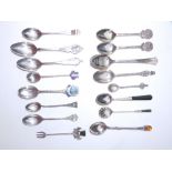 Six various enamelled silver teaspoons, a plique-a-jour 800 standard coffee spoon, eight other small