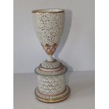 A Graingers Worcester porcelain reticulated stemmed vase standing on circular pedestal, sparingly