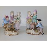 A pair of 19thC Meissen porcelain figure groups each depicting the amorous advances of a youthful