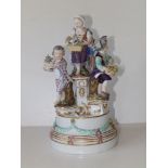 A Meissen porcelain group, depicting four children on pedestals of differing heights, possibly