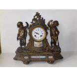 A 19thC French ormolu mantel clock by Deprez, Paris, the convex enamel dial flanked by a pair of