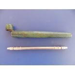 A 19thC gold double-ended propelling pencil, 5", in green shagreen cylindrical case.