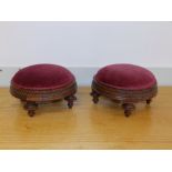 A pair of Victorian upholstered walnut circular footstools with parquetry friezes, 10" diameter. (