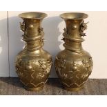 A pair of 20thC Chinese brass vases, having applied & raised dragon decoration, ornate cast seal