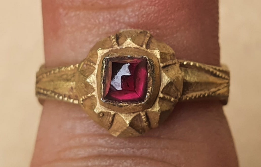 A 15thC silver-gilt finger ring with square cut garnet. - Image 3 of 4