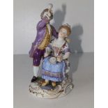 A small Meissen porcelain figure group depicting a gentleman with seated lady indulging in