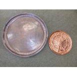 An Eastern copper circular tray, 26.5" diameter and one other. (2)