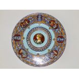 A Gien faience dish decorated with renaissance style medallions, 11.5" diameter.