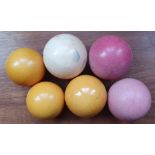 An antique ivory snooker ball and five coloured snooker balls, 2". (6)