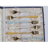 A cased set of six Ela Danish enamelled Sterling silver-gilt forks, 4.75".