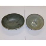 A celadon bowl, 10.5" diameter and an oval bowl, 13" across. (2)