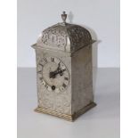A 20thC silvered metal lantern style mantel clock with English 'Mercer' movement, 8" high overall.