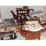 Two Cardew pottery novelty teapots, a Bovey Pottery Coronation Street teapot and a Portmeirion stove