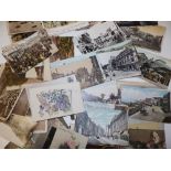 Approximately 200 early 20thC & later postcards.