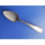 A white metal thread edge tablespoon bearing indistinct hallmarks including an italic date letter,