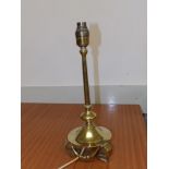 A brass Arts & Crafts table lamp, 13" high.