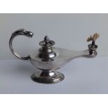 A silver Aladdin's lamp table lighter - WHW, Birmingham 1901, 5.8" across.