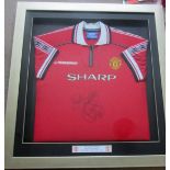 MANCHESTER UNITED OLE GUNNER SOLSKJAER SIGNED & FRAMED SHIRT