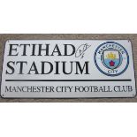 MANCHESTER CITY METAL STREET SIGN AUTOGRAPHED BY NATHAN AKE
