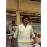 CRICKET - KAPIL DEV AT EDGBASTON HAND SIGNED PHOTOGRAPH