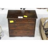 Early 20th century miniature chest of drawers, 23 cm wide, 14 cm deep,