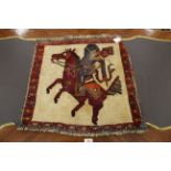 Wool wall hanging of a mounted archer 54 x 56 cm