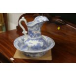 Blue and white oriental patterned jug (30 cm high) and bowl (35 cm diameter)