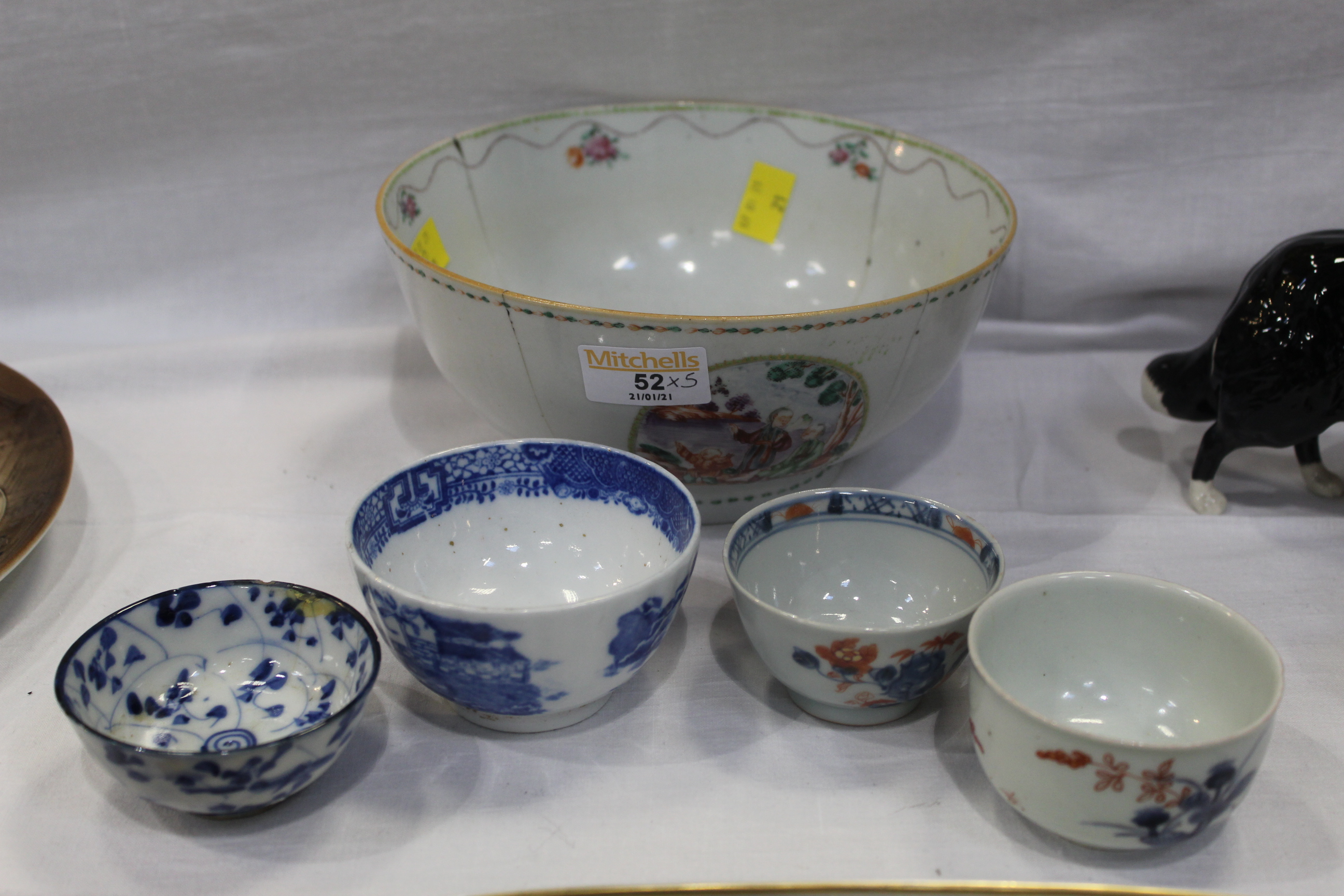 Four oriental tea bowls and a late 19th century oriental bowl