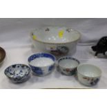 Four oriental tea bowls and a late 19th century oriental bowl