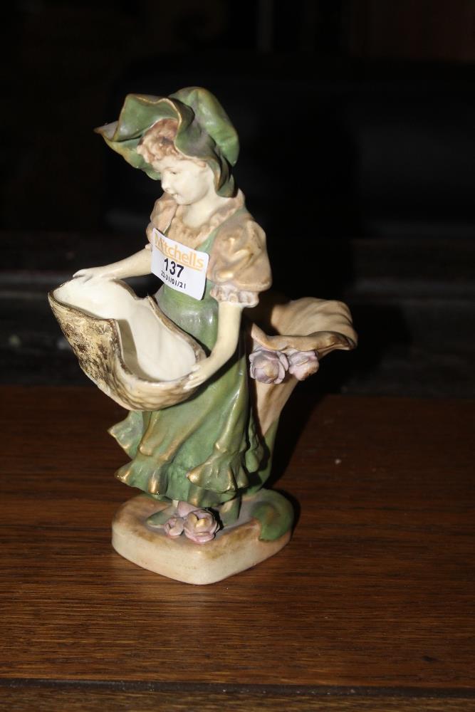 An Austrian figural vase, decorated and