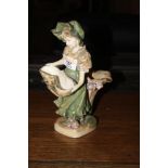 An Austrian figural vase, decorated and