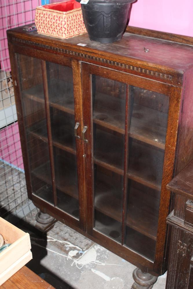 A glazed oak display case or bookcase, c