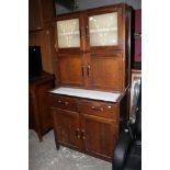 An 1950's oak Neatette kitchenette, with