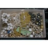 A box of miscellaneous costume jewellery