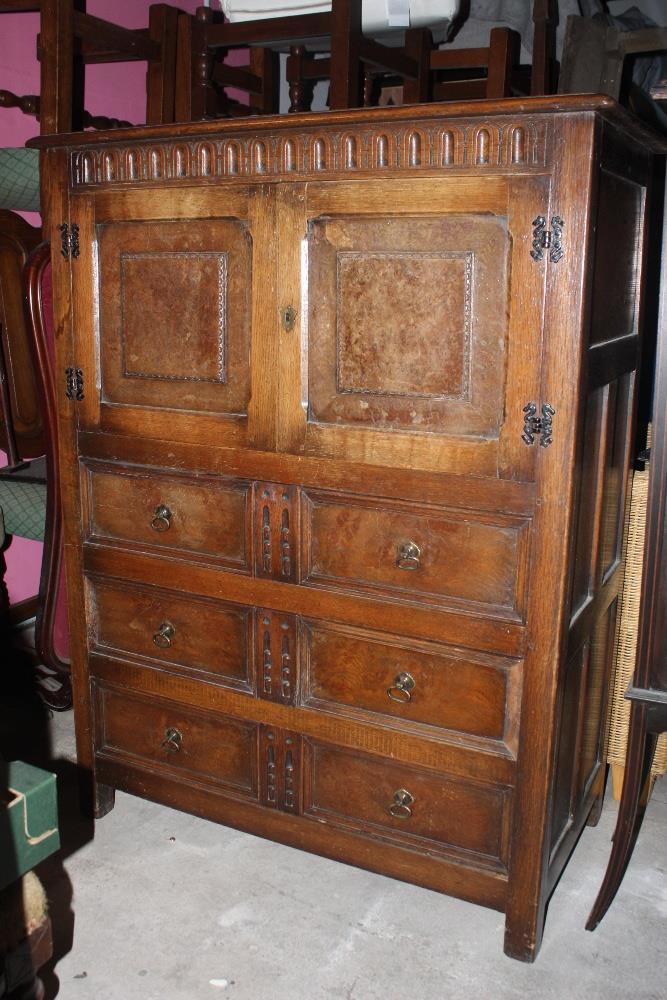 A reproduction oak tallboy chest, with m