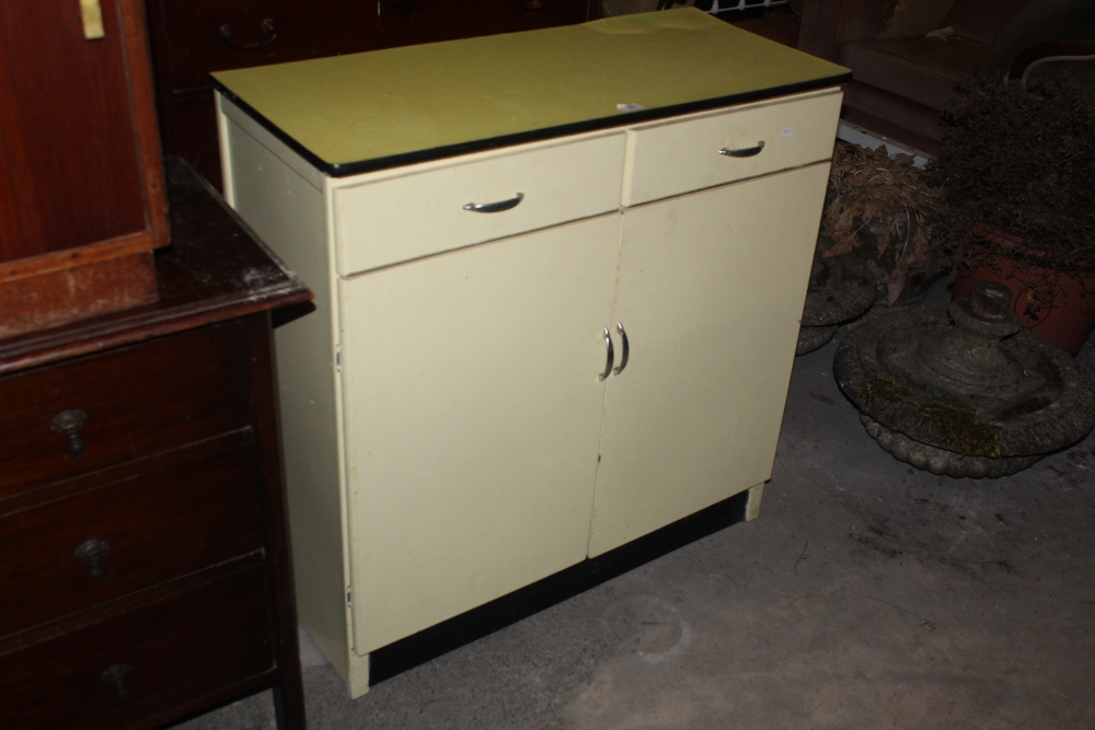 An 1950's cream painted and yellow melam