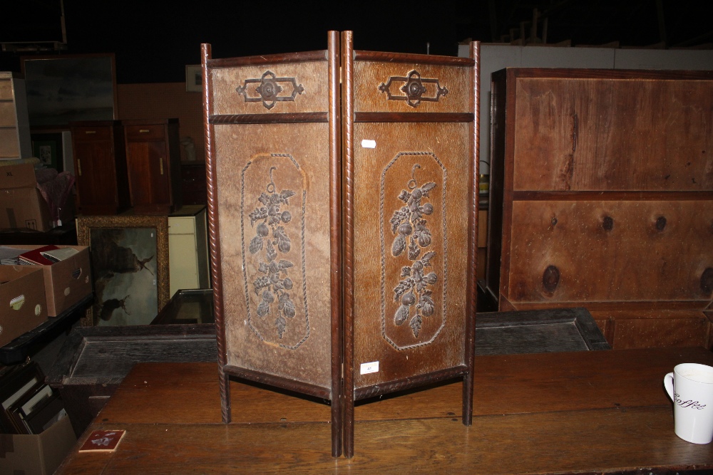 An early 20th century oak and decorated