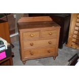 A pine 2/2 chest of drawers, with shaped