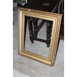 A swept gilt picture frame, 83 cm x 65 c